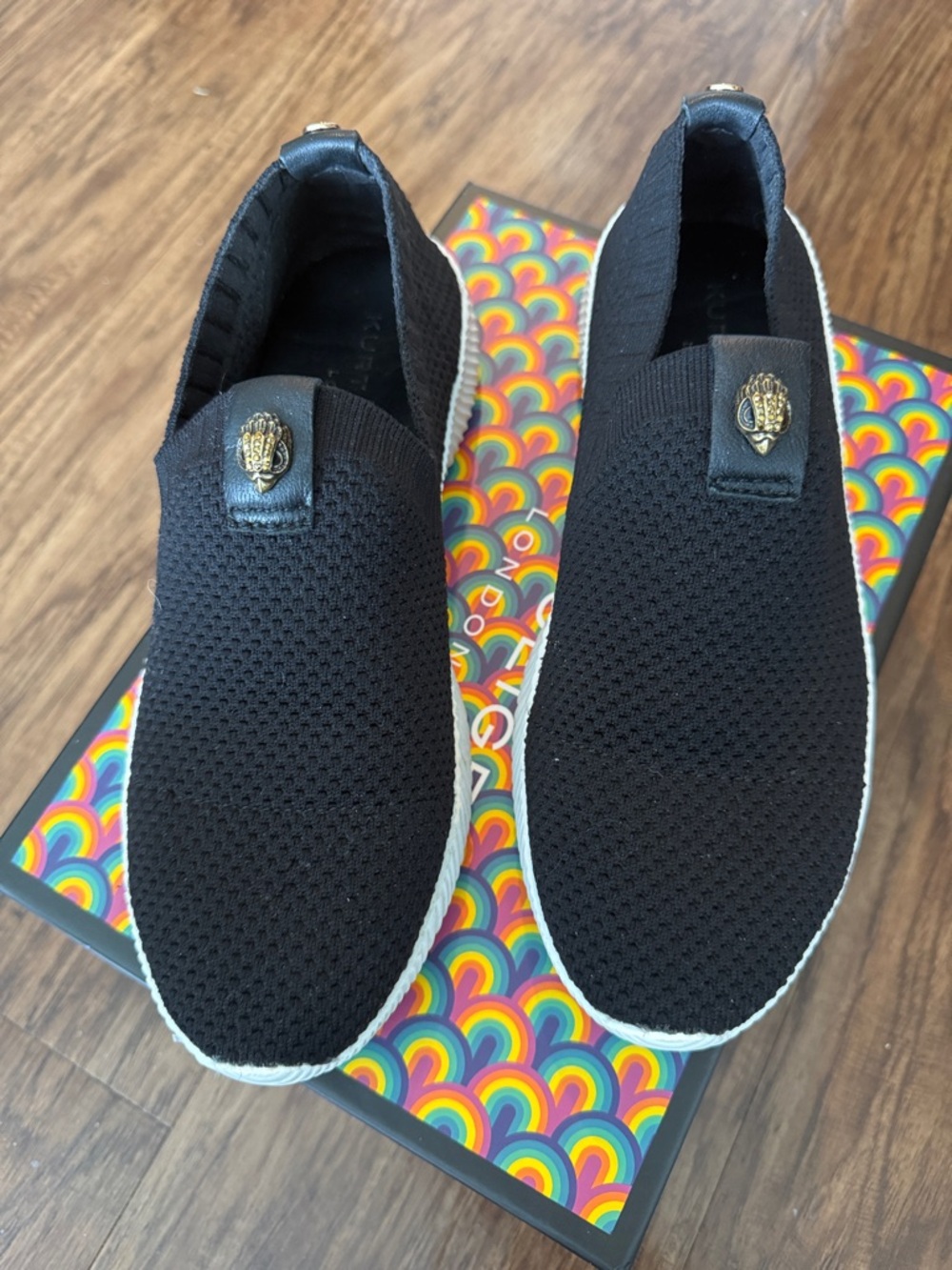 Kurt Geiger Black Knit Slip-On Sneakers with Gold Emblem